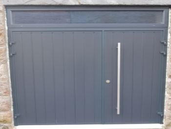 D1: CarTeck insulated side-hinged doors in Anthracite Grey vertical rib in one third two third split with long pull handle